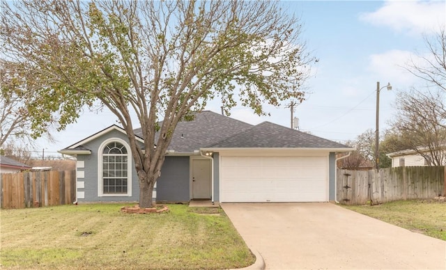 single story home with a garage and a front yard