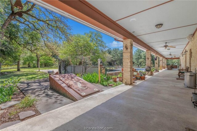 view of patio featuring ceiling fan