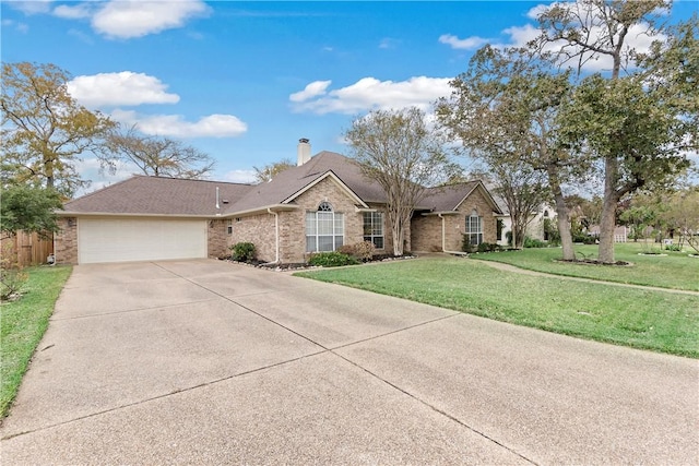 ranch-style house with a front yard and a garage