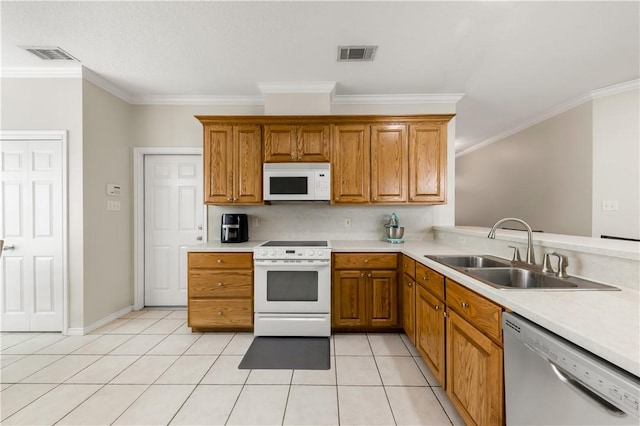 4414 Pickering Pl, College Station, TX 77845 - kitchen featuring white appliances, a sink, ornamental molding, light countertops, and brown cabinetry