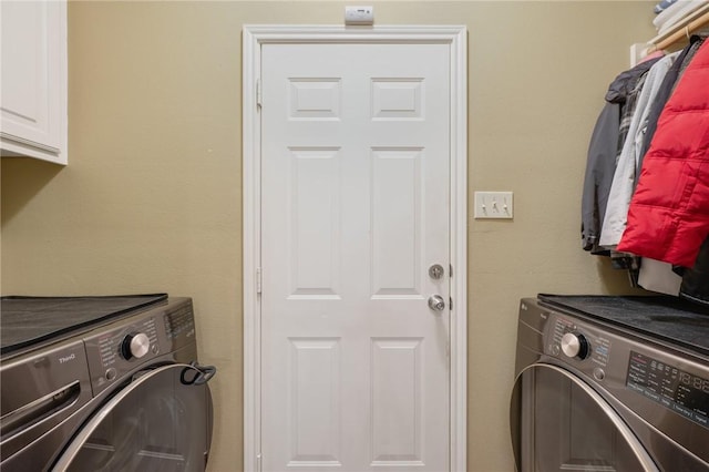 1610 Ethic Ln, College Station, TX 77845 - laundry room featuring washing machine and dryer and cabinet space