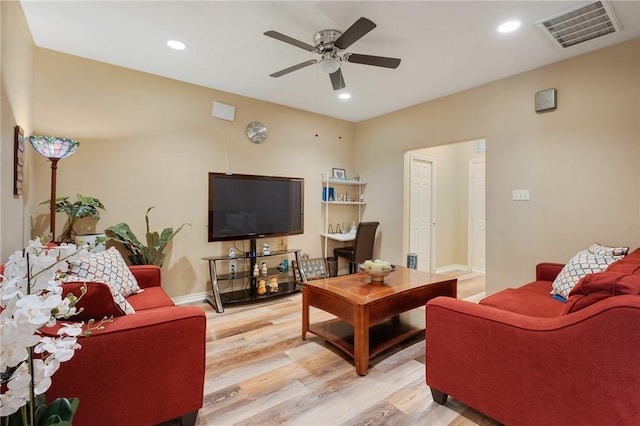 1610 Ethic Ln, College Station, TX 77845 - living room with light wood-style floors, ceiling fan, recessed lighting, and baseboards