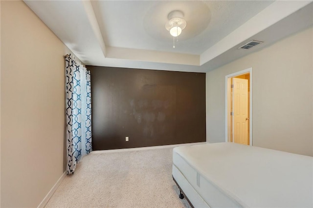 1610 Ethic Ln, College Station, TX 77845 - bedroom featuring baseboards, a raised ceiling, and ceiling fan