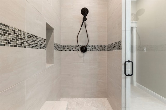 bathroom with a shower stall