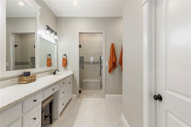 bathroom with recessed lighting, vanity, baseboards, a stall shower, and crown molding