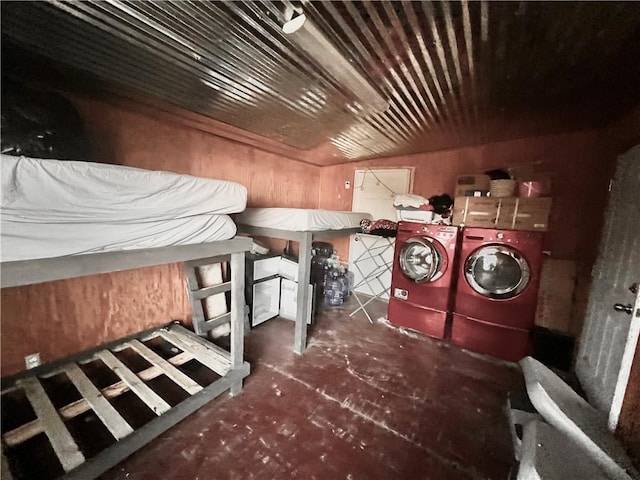 clothes washing area featuring washer and clothes dryer