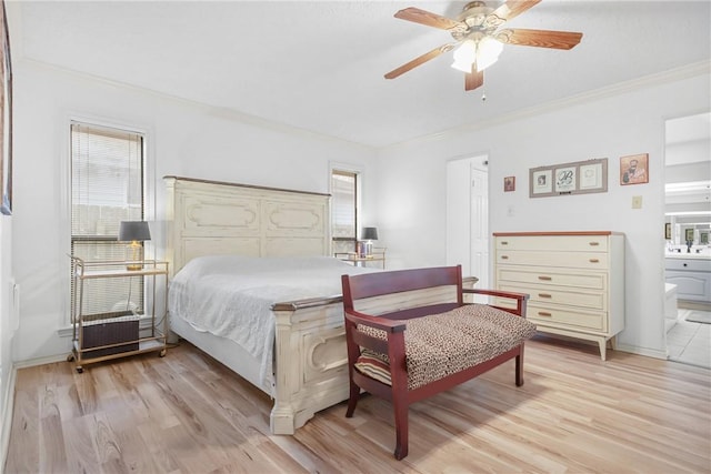 8700 Bent Tree Dr, College Station, TX 77845 - bedroom with crown molding, light wood-style flooring, multiple windows, and ensuite bath