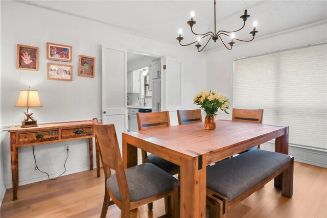 8700 Bent Tree Dr, College Station, TX 77845 - dining room with a chandelier and light wood-style floors