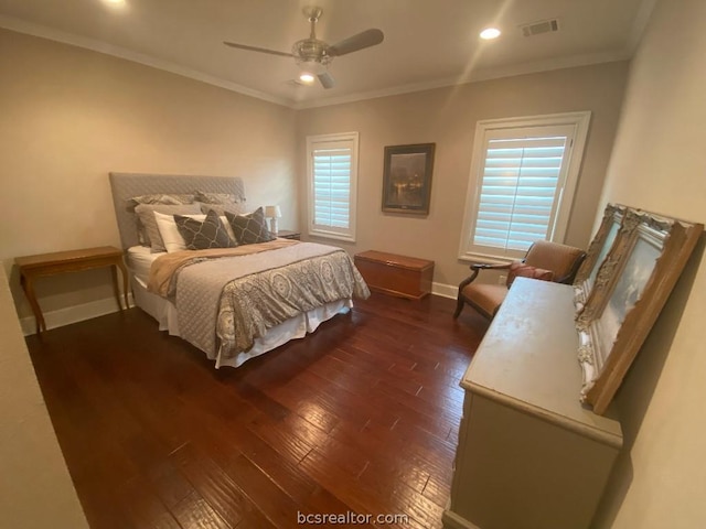 bedroom with multiple windows, ceiling fan, dark hardwood / wood-style flooring, and ornamental molding