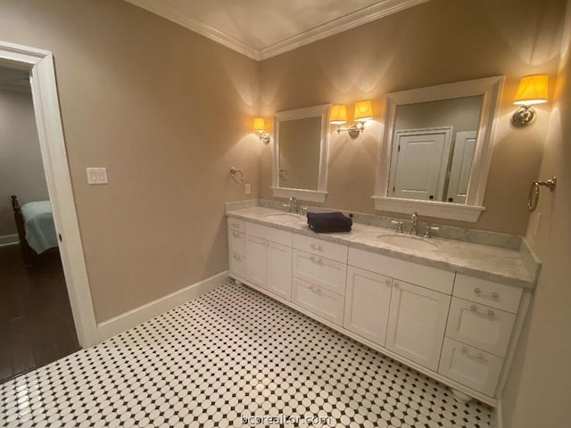 bathroom featuring vanity and ornamental molding