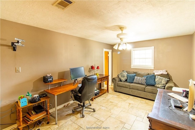 office with a textured ceiling and an inviting chandelier