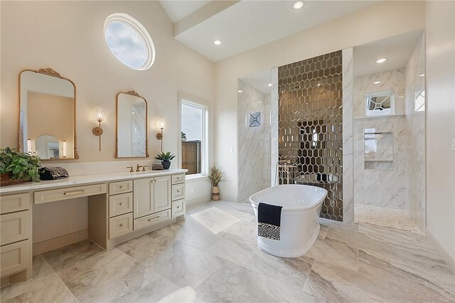 bathroom with plus walk in shower and vanity