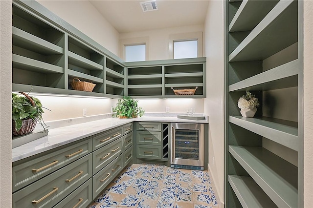 pantry featuring wine cooler