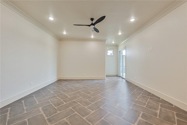 unfurnished room featuring ceiling fan and ornamental molding