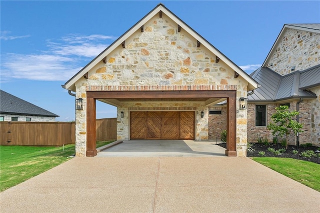 view of front facade with a garage and a front lawn