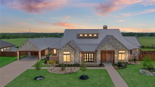 view of front of house with a carport and a lawn