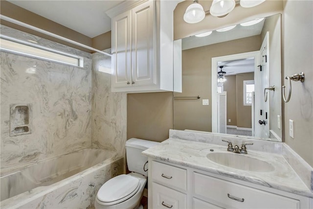 full bathroom with vanity, toilet, plenty of natural light, and shower / washtub combination