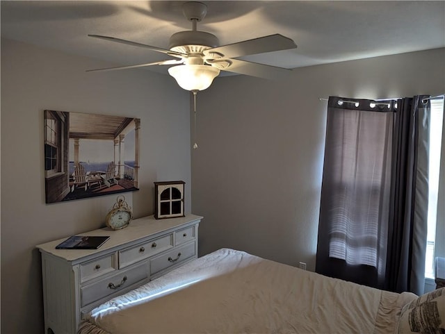 bedroom featuring ceiling fan