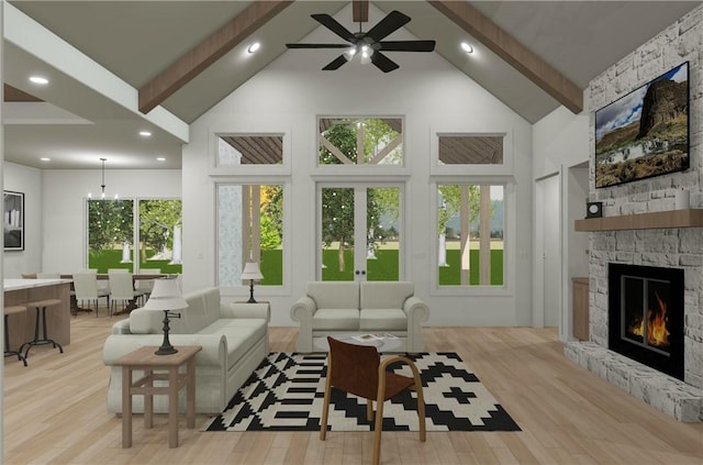 living room with high vaulted ceiling, a stone fireplace, light hardwood / wood-style floors, and beam ceiling