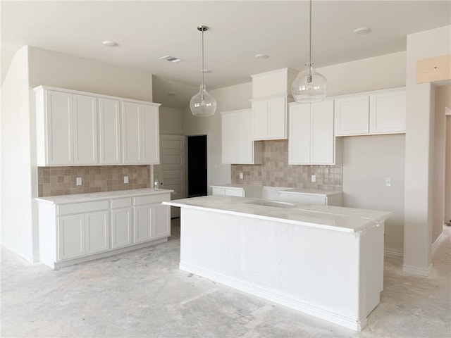 3148 Margaret Rudder Pkwy, Bryan, TX 77808 - kitchen with decorative backsplash, white cabinetry, and hanging light fixtures