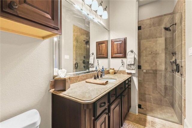 11376 Majestic Dr, Montgomery, TX 77356 - bathroom with a shower stall, toilet, and vanity
