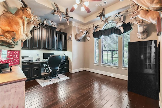11376 Majestic Dr, Montgomery, TX 77356 - home office with baseboards, a ceiling fan, built in study area, dark wood-type flooring, and ornamental molding