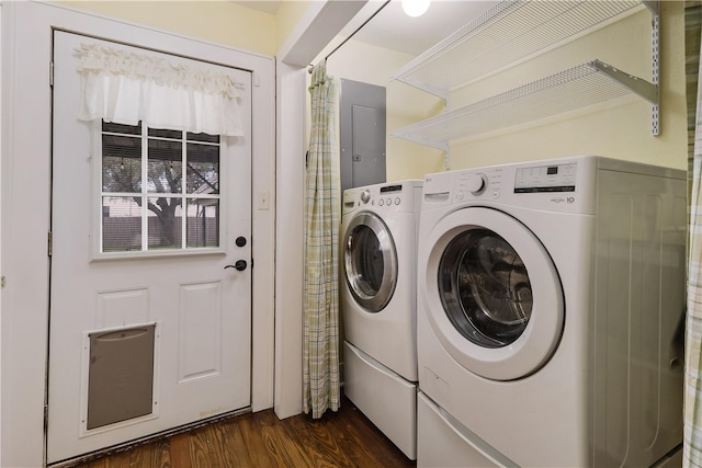 washroom with laundry area, electric panel, and washing machine and dryer