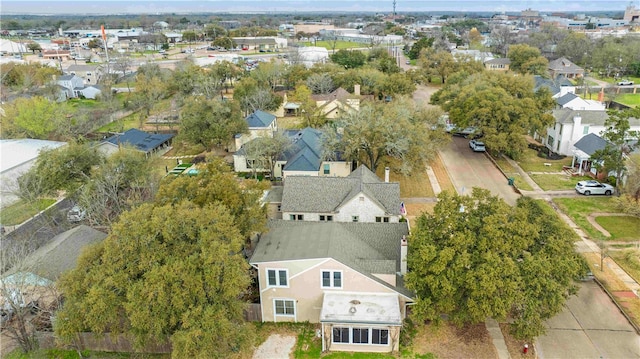 birds eye view of property with a residential view