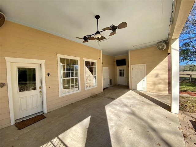 view of patio with ceiling fan