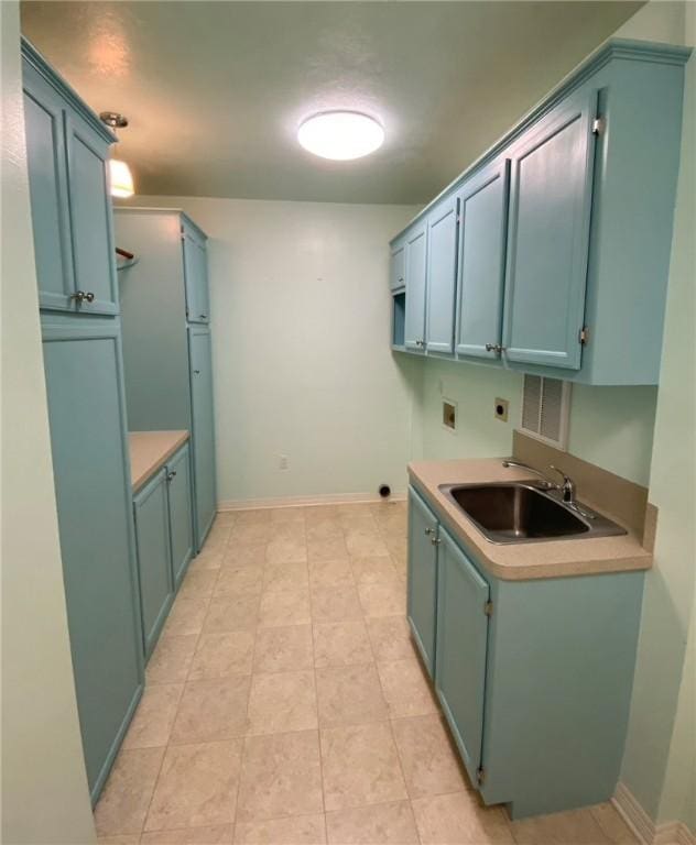 laundry room with washer hookup, sink, cabinets, and hookup for an electric dryer