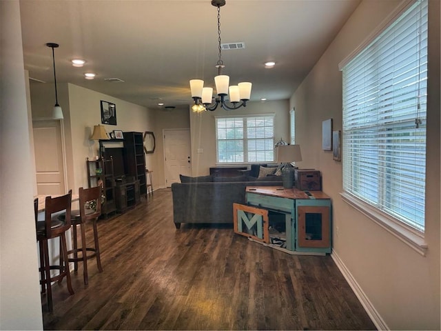 living area with an inviting chandelier, visible vents, baseboards, dark wood-style floors, and recessed lighting