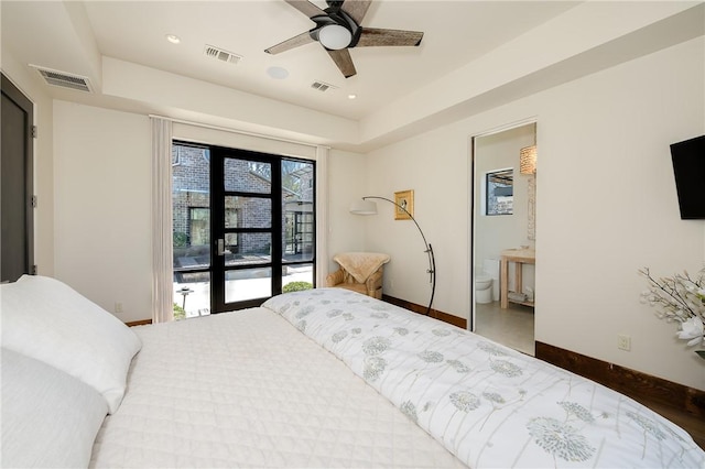 bedroom with visible vents and baseboards