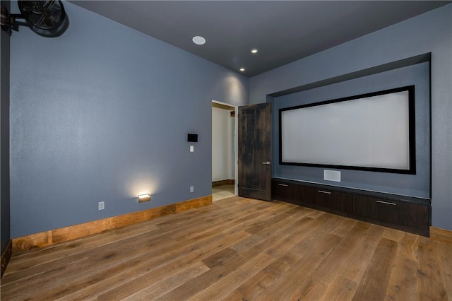 home theater with recessed lighting, baseboards, and wood-type flooring