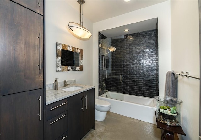 bathroom with tub / shower combination, toilet, vanity, and concrete flooring