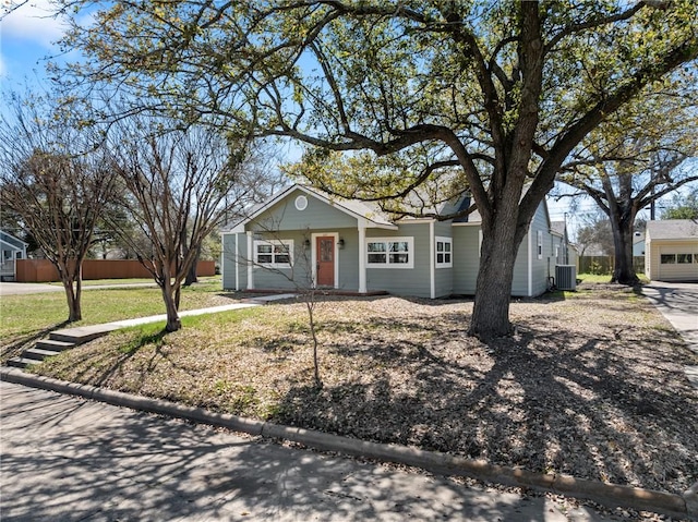 ranch-style home with central AC unit