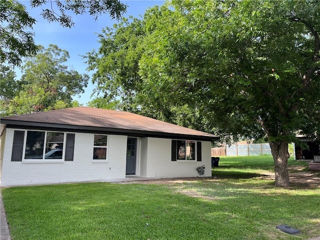 502 Willow Cir, Brenham, TX 77833 - view of front of property featuring brick siding and roof with shingles