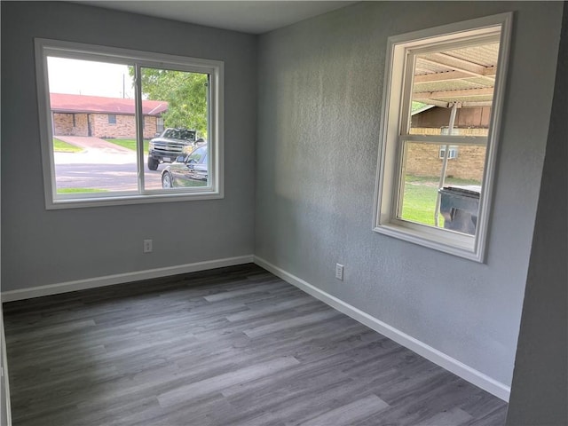 502 Willow Cir, Brenham, TX 77833 - empty room featuring wood finished floors and a textured wall