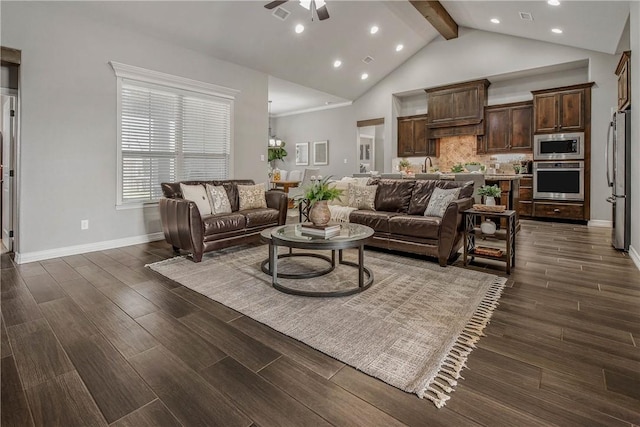 living room with ceiling fan, beamed ceiling, dark hardwood / wood-style floors, and high vaulted ceiling