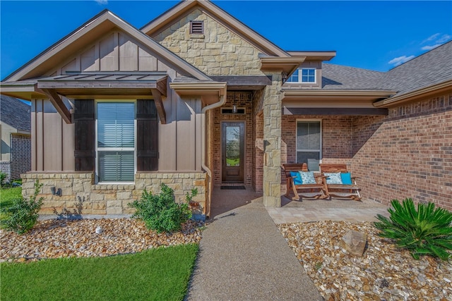 property entrance with a patio