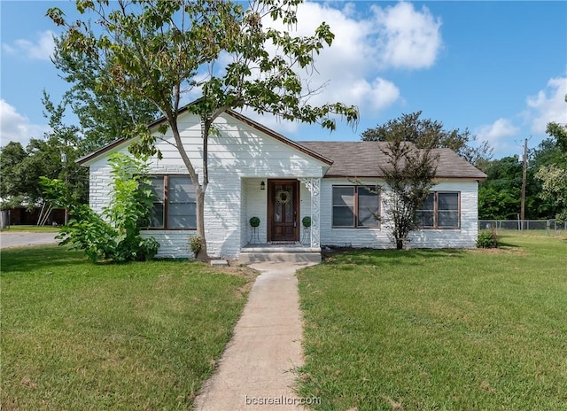 view of front of home with a front yard