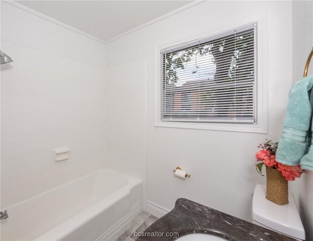 bathroom featuring washtub / shower combination, toilet, and ornamental molding