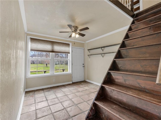 1205 King Arthur Cir, College Station, TX 77840 - stairway featuring baseboards, a ceiling fan, tile patterned flooring, and crown molding