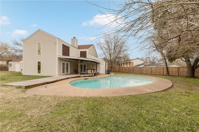 1205 King Arthur Cir, College Station, TX 77840 - view of swimming pool featuring french doors and a patio