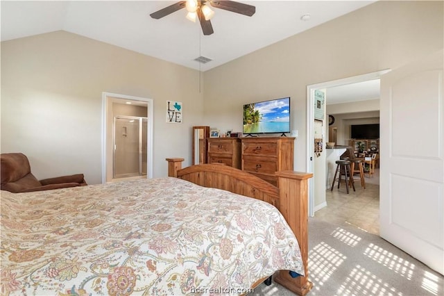 tiled bedroom featuring ceiling fan and lofted ceiling