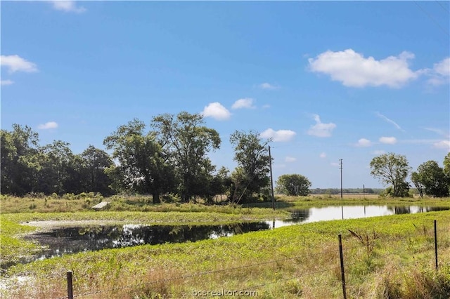 view of yard with a water view