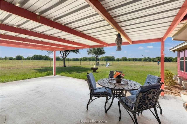 view of patio with a rural view