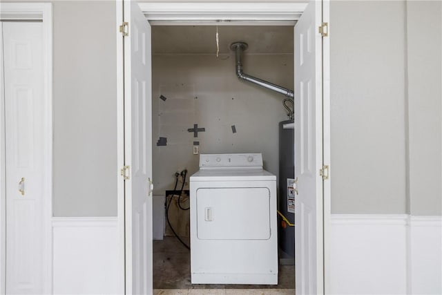 laundry room featuring gas water heater and washer / clothes dryer