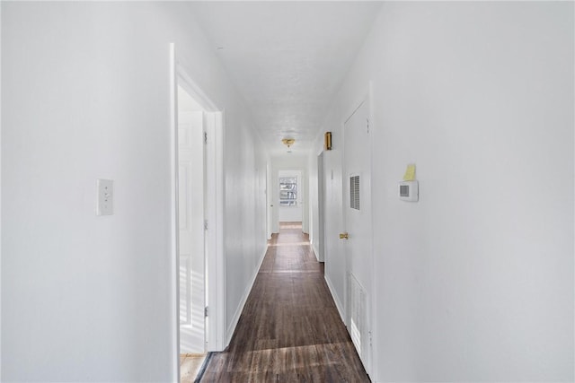 hall featuring dark hardwood / wood-style flooring