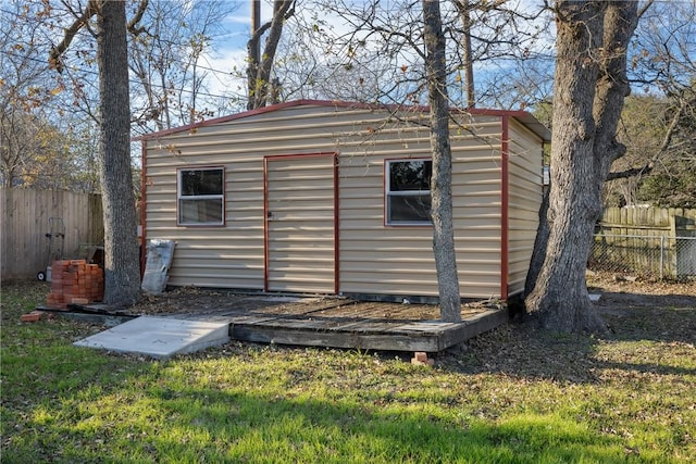 view of outdoor structure with a yard