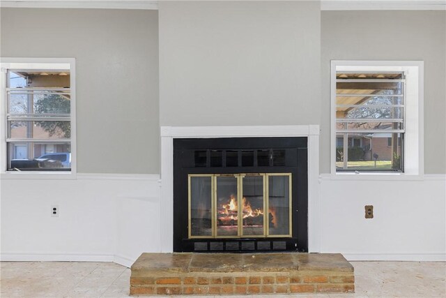 interior details featuring a fireplace